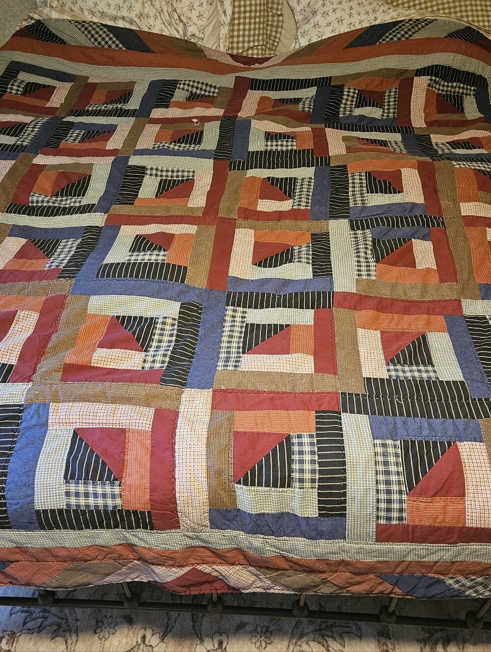 Patchwork Quilt in Red, Blue, Black, Brown